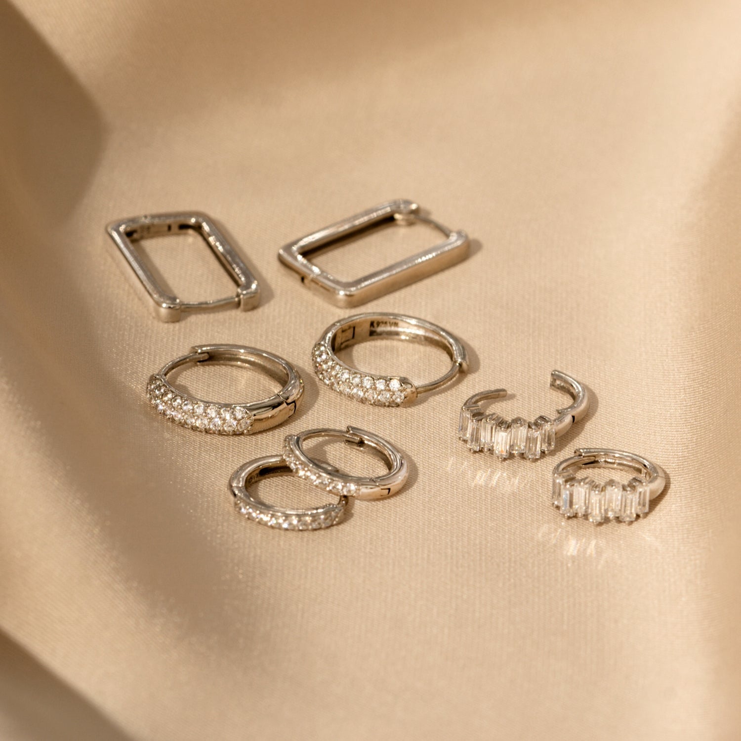 PavÃ© Huggie Hoop Earrings